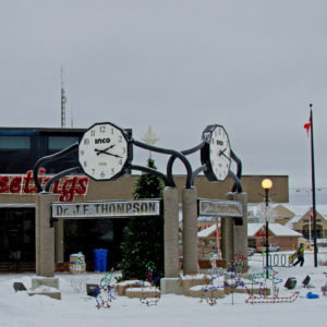"A tower clock specifically designed to withstand the harsh cold weather in Manitoba, Canada, is shown standing tall against a frigid winter landscape. With temperatures reaching as low as -56°F (-49°C), the clock's robust construction and specialized materials allow it to continue functioning despite the extreme cold