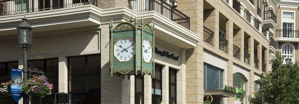 Exterior Bracket Clock installed on the side of a building