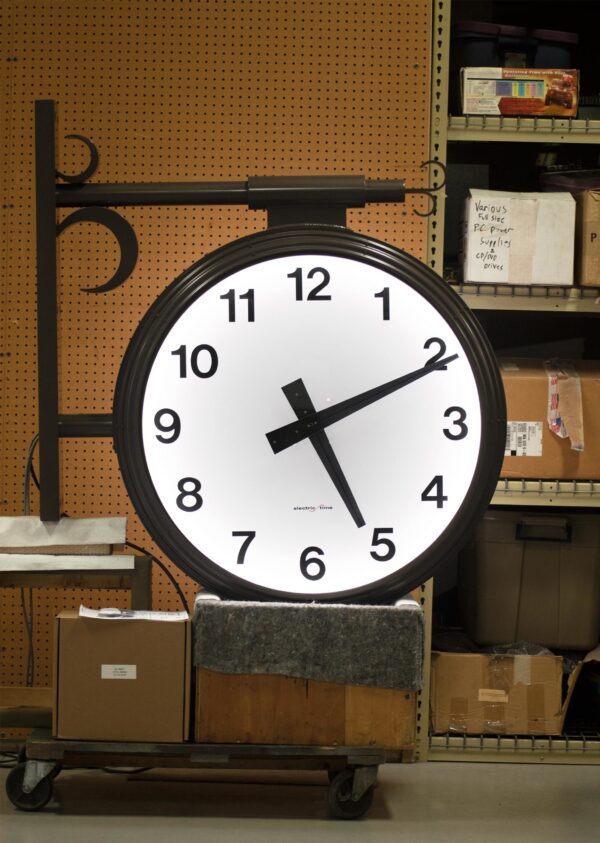 Two-Sided Bracket Clock (Projecting Clock) on test in manufacturing facility.