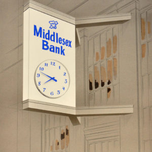 Sidewall mounted bank clock