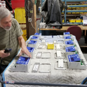 Exterior Clock Control being manufactured