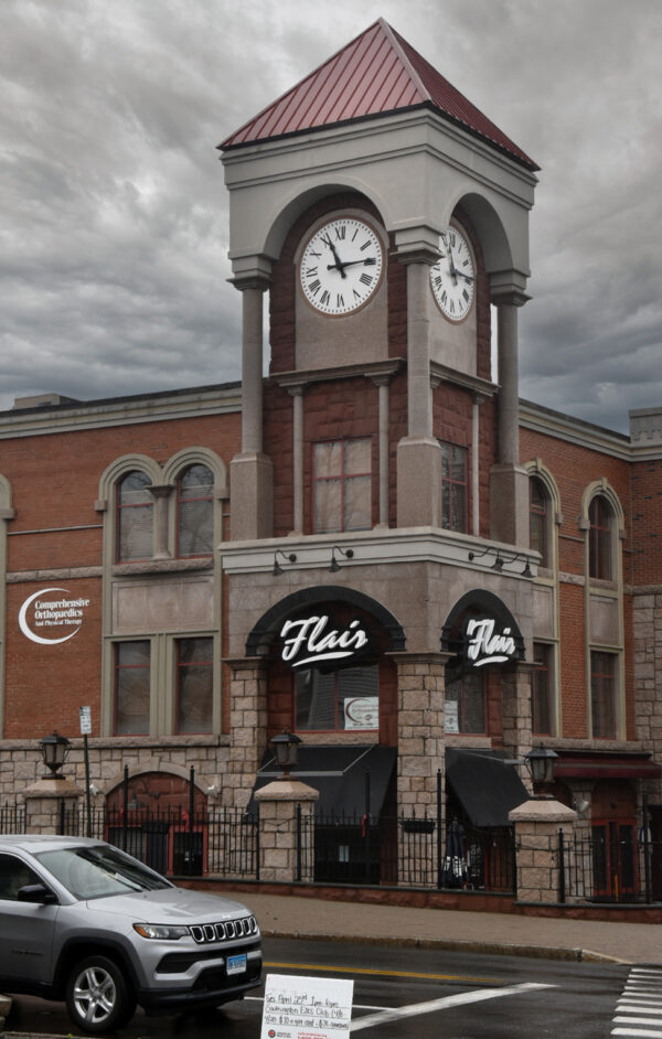 Photo of a 6-foot diameter tower clock in Southington, CT, equipped with Roman Numeral with Minute mark dial markings and Spade Type hands.