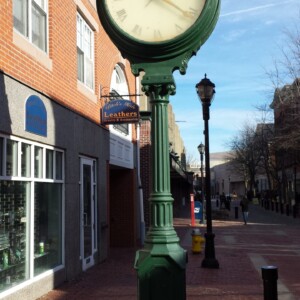 Almy’s Clock on Essex Street in Salem, showing its weathered, pre-restoration condition