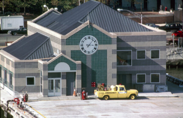Tower clock installed at the New York City 6th Avenue Heliport, featuring a classic Roman numeral dial