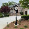 A classic residential street clock with two dials on a post design